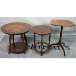 A George III and later mahogany tripod table, with octagonal top over three downswept supports,