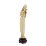 A Chinese ivory figure of a musician, early 20th century,