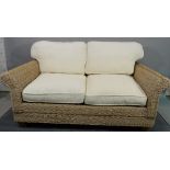 A modern rattan conservatory suite, comprising a sofa, 170cm wide x 76cm high, and two armchairs,