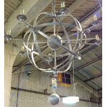 A 20th century steel armillary sphere eight branch chandelier, 97cm wide x 70cm high.