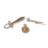 A gold and cultured pearl brooch, designed as two golf clubs, a 9ct gold fob medal,