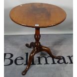 A George III and later mahogany tripod table, on birdcage surmount on three outswept supports,