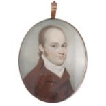 Georgian gold mounted miniature of a gentleman, reverse of woven hair and graduate pearls set,