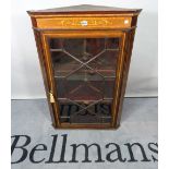 An Edwardian inlaid mahogany corner display cabinet, on bracket feet, 72cm wide x 204cm high.