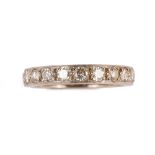 An 18ct white gold and diamond set full eternity ring, mounted with circular cut diamonds,