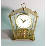 A modern stylised anniversary type mantel clock by 'KUS-MIV', Germany, 24cm high.