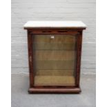 A 19th century Continental marble top display cabinet, with tortoiseshell inlaid yew frame,