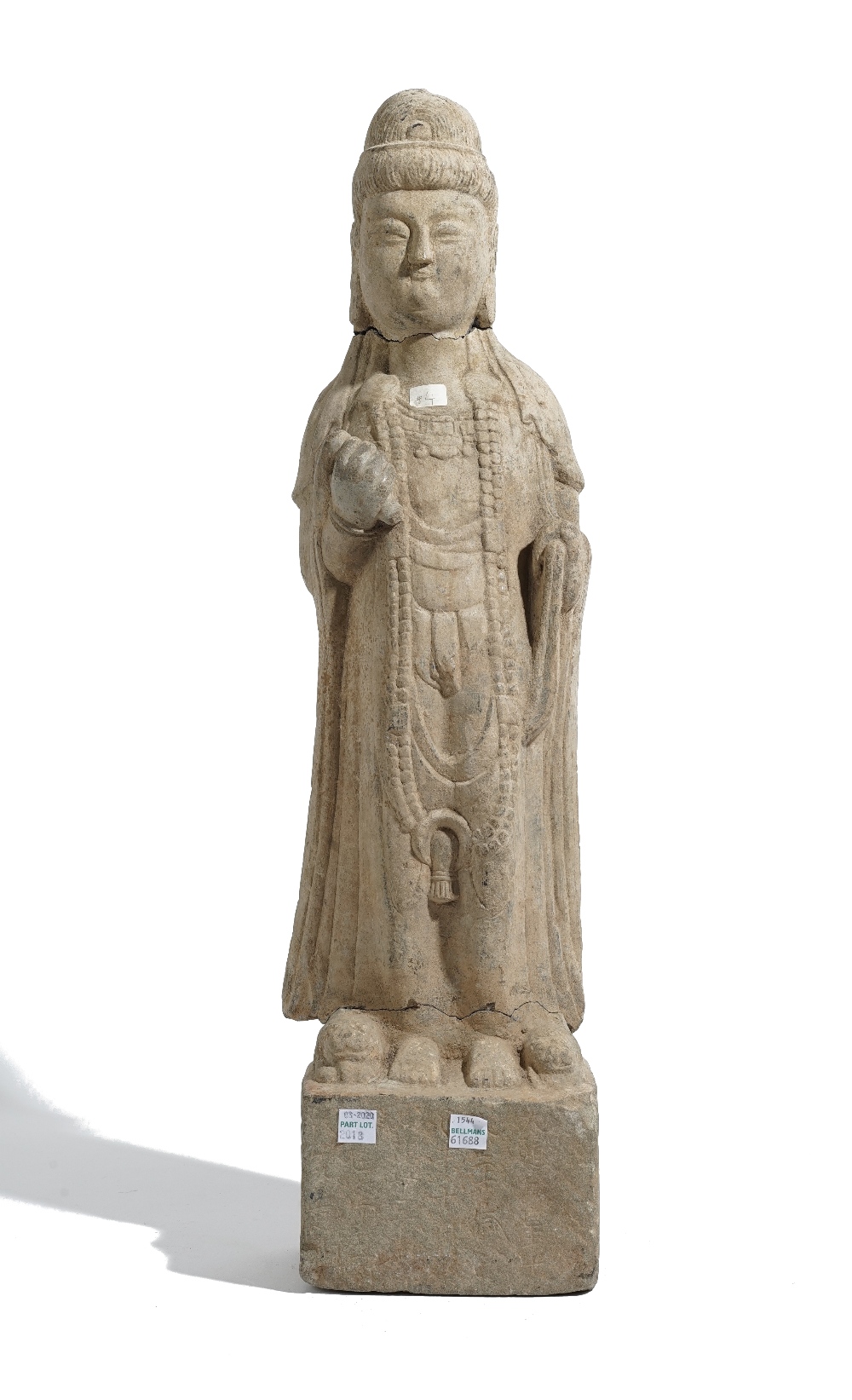 A tall Chinese stone figure of Buddha,
