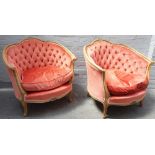 A pair of beech framed tub back armchairs of Louis XV design, on scroll feet, 86cm wide x 82cm high.