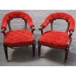 A pair of Victorian walnut frame library armchairs, circa 1870,