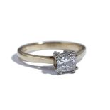 An 18ct gold and diamond single stone ring, claw set with a princess cut diamond,