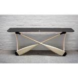 A 20th century console, the ebonised top over a base of two crossed rowing oars,