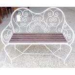 A modern white painted metal wirework garden bench, 110cm wide x 95cm high.