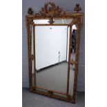 A 19th century French gilt framed marginal cushion mirror,