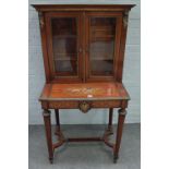 A Louis XVI style mahogany crossbanded boxwood and ebony strung marquetry and gilt metal mounted