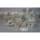 A quantity of mostly 20th century cut glass, including cups, glasses, bowls and sundry.