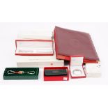 A Must de Cartier tri-colour stainless steel and gold plated money clip,