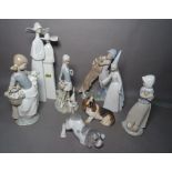 A group of seven Lladro figures (a.f) and a resin Leonardo Collection basset hound (8).