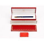 A Must de Cartier blue lacquered and gold plated fountain pen,