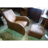 After Matthew Hilton, a mid-20th century leather low armchair, 68cm wide x 85cm high,