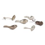 A silver and filigree caddy spoon, Birmingham 1802, a silver caddy spoon,