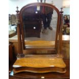 A large Victorian mahogany toilet mirror, with serpentine lift top base, 68cm wide x 86cm high.