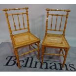 A pair of modern faux bamboo side chairs, 42cm wide x 90cm high,