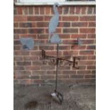 A wrought iron weather vane with cormorant mount, 65cm wide x 118cm high.