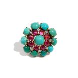 A gold, diamond, cabochon ruby and turquoise set shaped circular brooch,