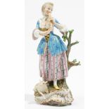 A Meissen figure of a shepherdess, late 19th century,