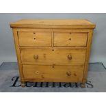 An early 20th century pine chest, of two short and three long drawers, 96cm wide x 81cm high.