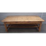 A 19th century Continental pine coffee table, with plank top and end frieze drawers,