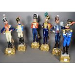 A group of six Naples style porcelain models of Napoleonic soldiers, the tallest 31cm high.