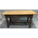 A late Victorian oak refectory table, on bulbous turned supports,