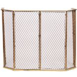 A Victorian brass and copper mesh nursery fire guard, 115cm wide x 90cm high.