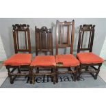 A matched set of four 18th century oak highback dining chairs, 46cm wide x 118cm high.