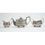 A Scottish silver three piece tea set, comprising; a teapot, Edinburgh 1813,