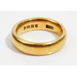 A 22ct gold wedding ring, ring size J and a half, London probably 1922, weight 9.8 gms, with a box.