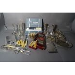 Silver plated items of mostly early 20th century including: pairs of candlesticks, flatware,