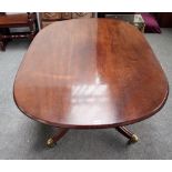 A George III mahogany breakfast table,