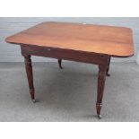 An early Victorian mahogany single leaf extending dining table, on reeded supports,