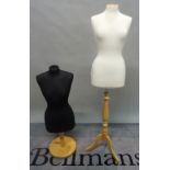 A modern female mannequin torso, on stained beech tripod base and another similar.