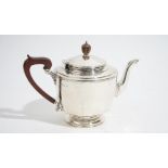 An Art Deco three piece silver tea service, by Selfridge & Co, Birmingham 1930,