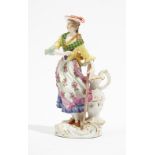 A Meissen figure of a shepherdess, early 20th century,