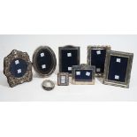 A silver mounted shaped rectangular photograph frame,