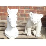 A modern white painted reconstituted stone bear, 43cm high,
