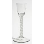 An opaque twist cordial glass, circa 1765,