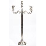 A modern chrome plated floor standing five branch candelabra, 147cm high.