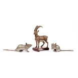 An Austrian cold painted bronze antelope, early 20th century, on a wooden stand, 11cm high,