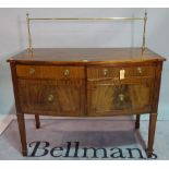 A George III single mahogany bowfronted sideboard, on tapering square supports,
